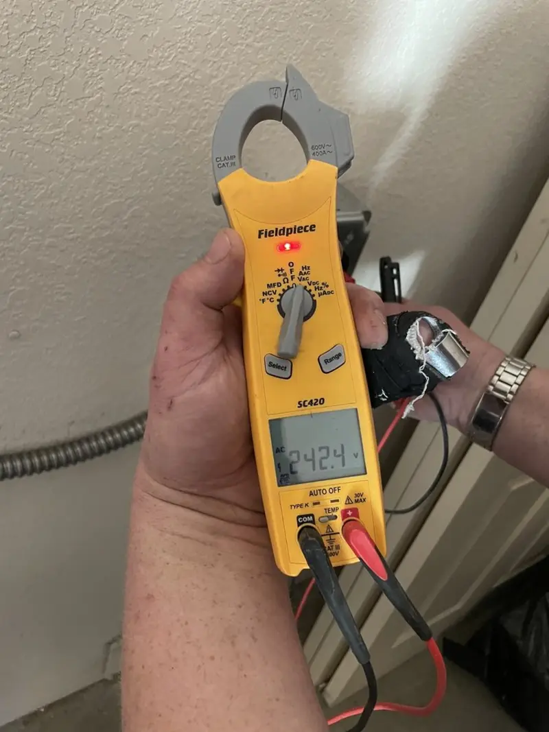 Voltage testing with clamp meter during Generator Installation in Novato